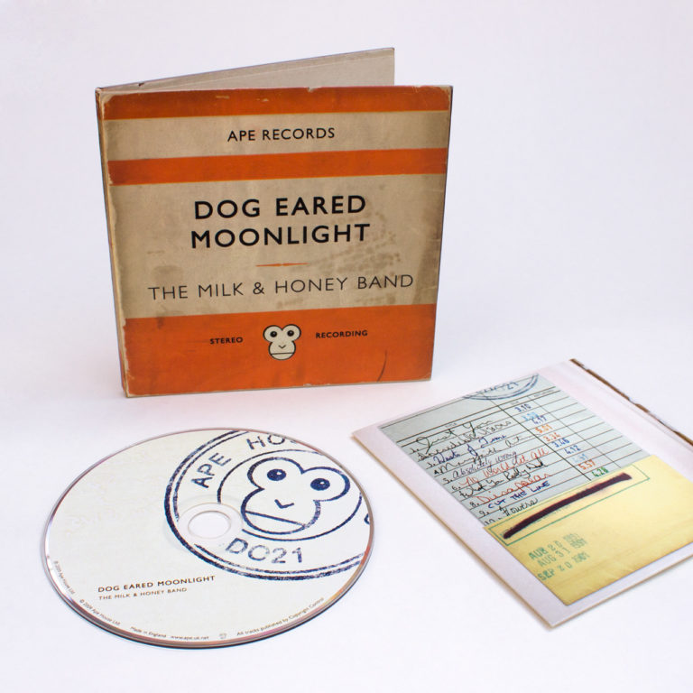 The CD packaging, including the wallet and the disc, for Dog Eared Moonlight by The Milk and Honey Band.