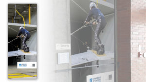 A mock-up of a graphic window panel for the entrance to the university's ACE wind tunnel facility, featuring an image of a man on flying kite platform that is being tested in the wind tunnel.